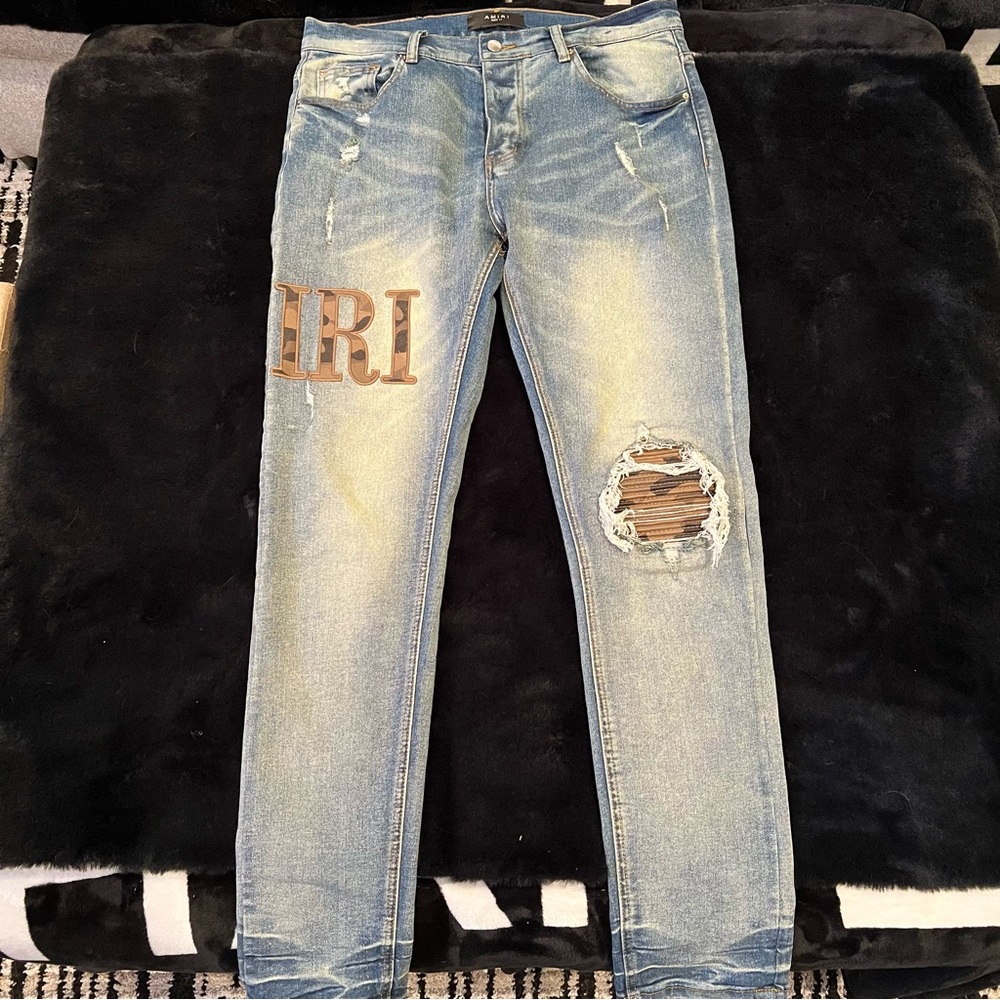 Amiri jeans with camouflage Logo